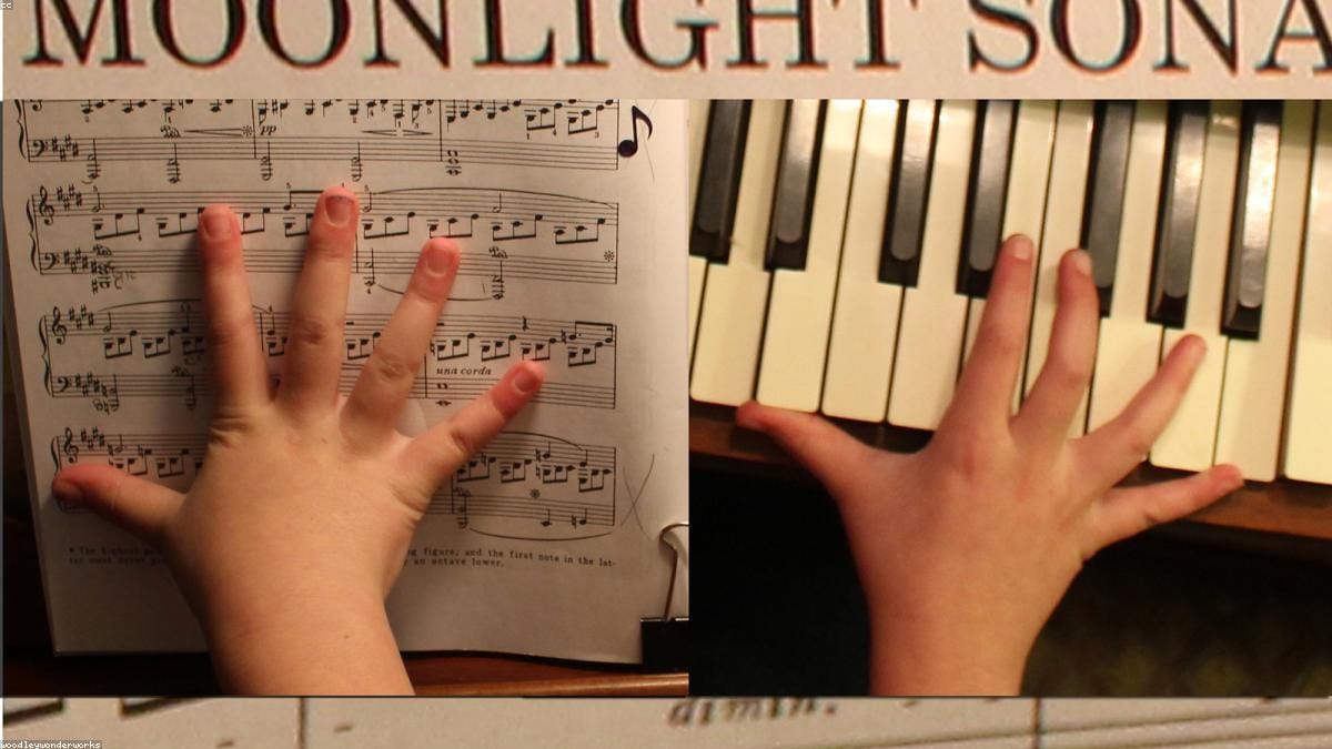 Close-up of piano sheet music with treble and bass clef staves